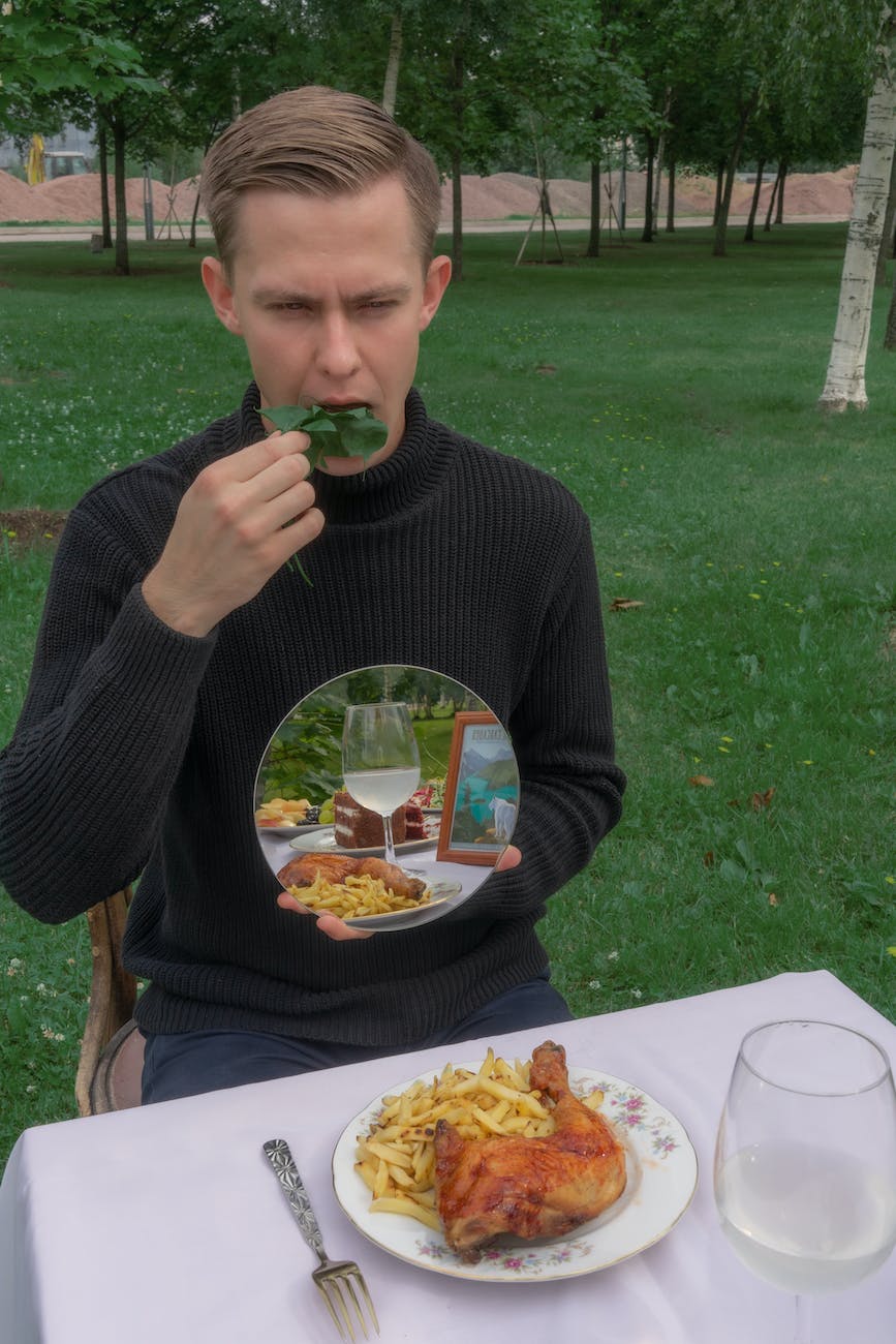 Man eating salad instead of junk food in park. For Flatulentapede.